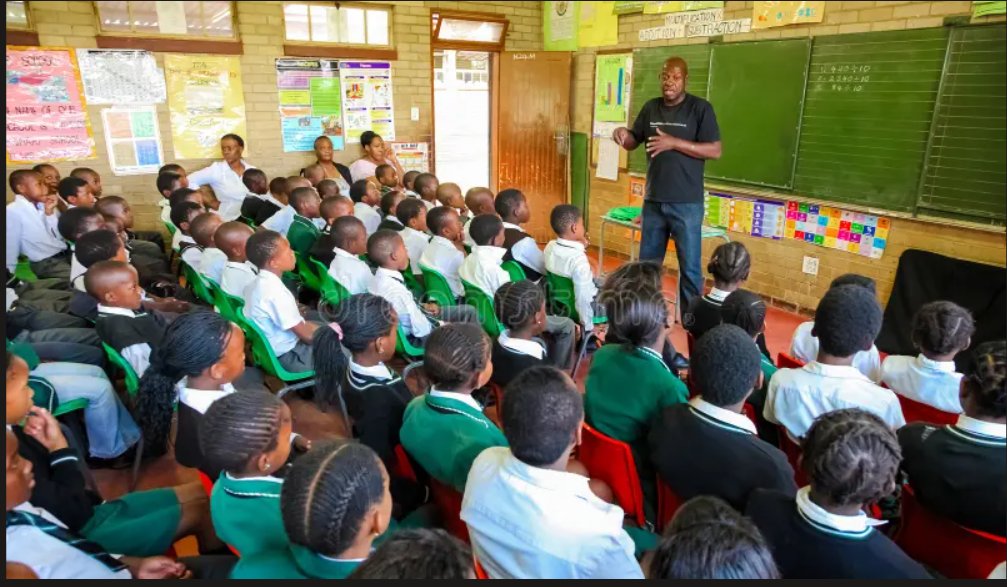 One teacher addressing a classroom of more than forty learners in South Africa
